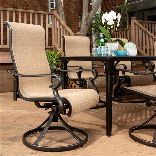 Hanover - Brigantine 9pc: 8 Sling Swivel Rockers, 60x84" Cast Dining Table - Cast/Tan-United Backyard