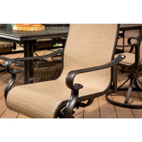 Hanover - Brigantine 9pc: 8 Sling Swivel Rockers, 60x84" Cast Dining Table - Cast/Tan-United Backyard