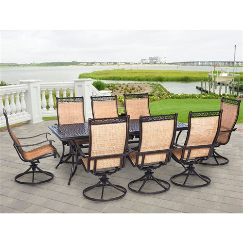 Hanover - Manor 9pc: 8 Sling Swivel Rockers, 42x84" Cast Table - Tan Sling/Cast-United Backyard