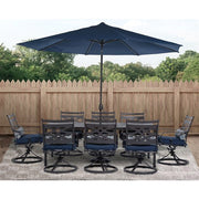 Hanover - Montclair 9pc: 8 Swivel Rockers, 42"x84" Dining Table, Umbrella, Base - Navy/Brown-United Backyard