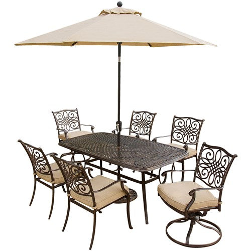 Hanover - Traditions 7pc: 4 Dining Chairs, 2 Swivel Rockers, 38x72" Cast Table, Umbrella, Base - Tan/Cast-United Backyard