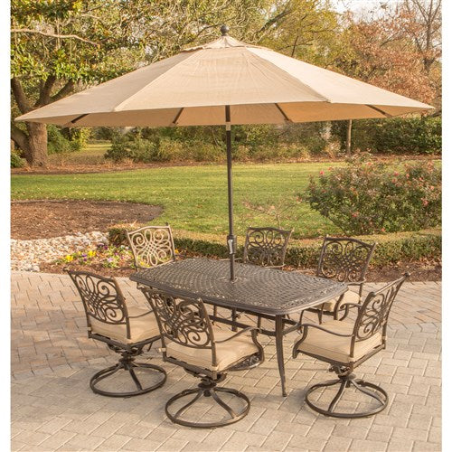 Hanover - Traditions 7pc: 6 Swivel Rockers, 38x72" Cast Table, Umbrella, Base - Tan/Cast-United Backyard
