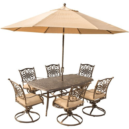 Hanover - Traditions 7pc: 6 Swivel Rockers, 38x72" Cast Table, Umbrella, Base - Tan/Cast-United Backyard