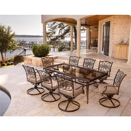 Hanover - Traditions 9pc: 8 Swivel Rockers, 42x84" Glass Top Table - Tan/Glass-United Backyard