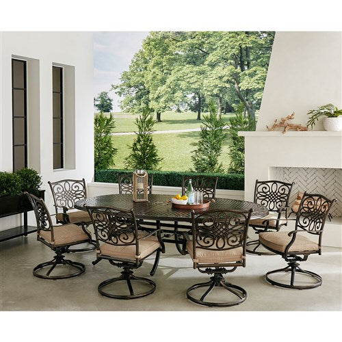 Hanover - Traditions 9pc: 8 Swivel Rockers, 96"x60" Oval Cast Table - Tan/Bronze-United Backyard