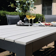 Hanover - Tucson 7pc: 6 Aluminum High Back Padded Chairs, Faux Wood Dining Table - Glass/Gray-United Backyard